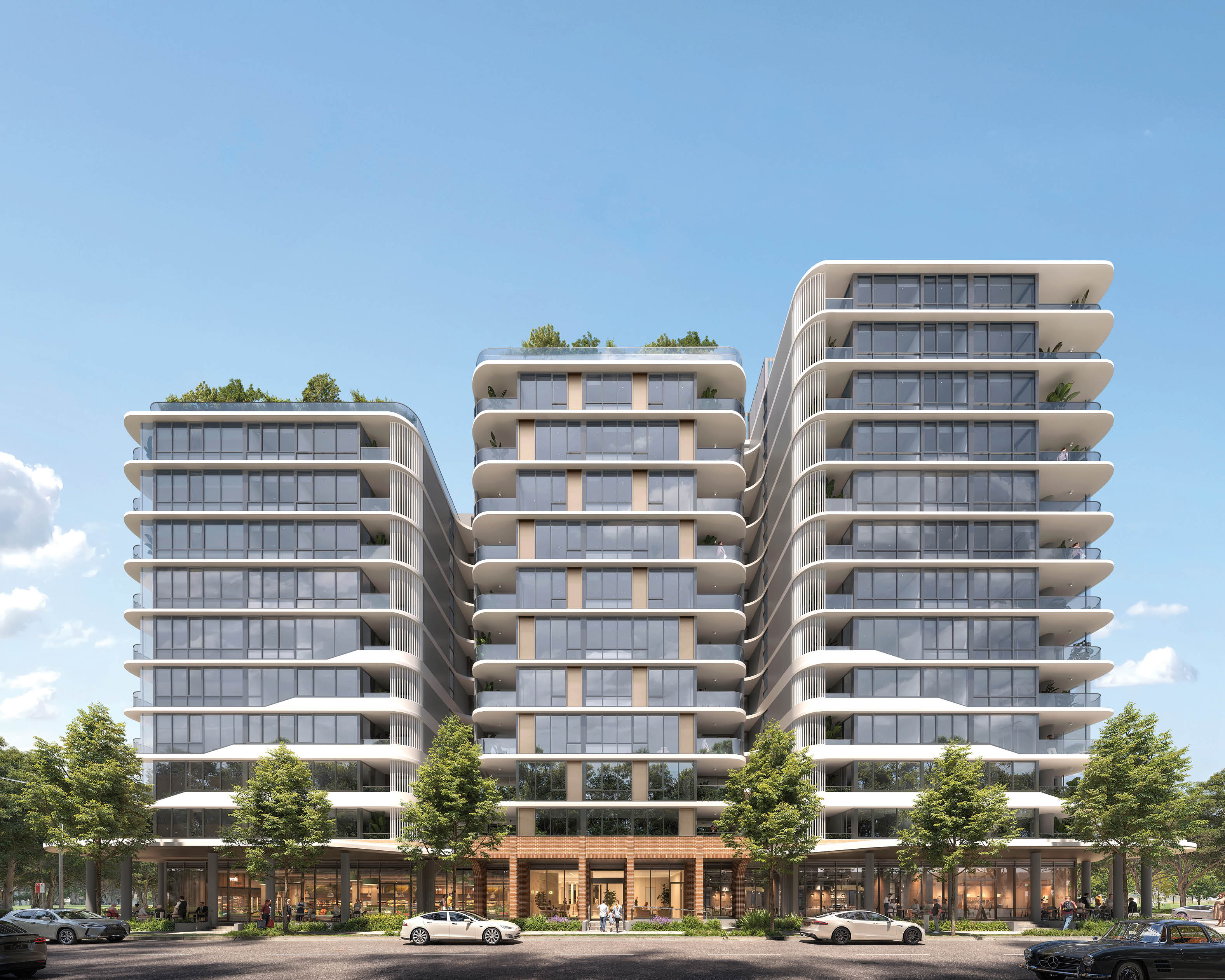 Two tall white buildings with balconies and greenery on top. Description generated by AI