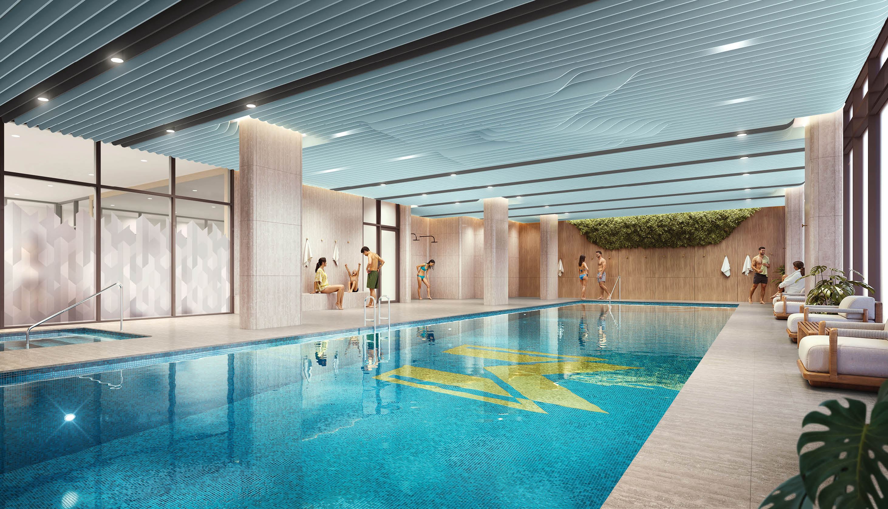 A large indoor pool with people swimming in it. Description generated by AI