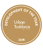 A gold circular badge with white text reading Development of the Year, Urban Taskforce Australia, and 2018. Description generated by AI
