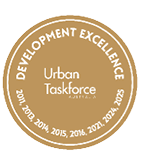 A gold circular emblem with the text Development Excellence around the top edge, Urban Taskforce Australia in the center, and years 2011, 2013, 2014, 2015, 2016, 2021, 2024, and 2025 listed along the bottom edge. Description generated by AI