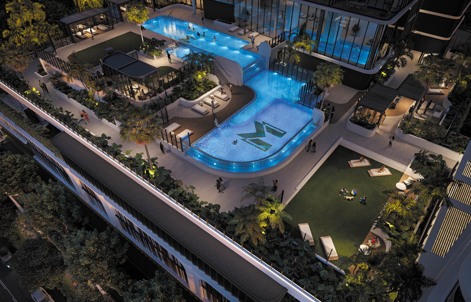 A modern rooftop pool area at night features a uniquely shaped illuminated pool with people swimming, surrounded by lounge chairs, greenery, and a grassy area where people are sitting and relaxing. Description generated by AI