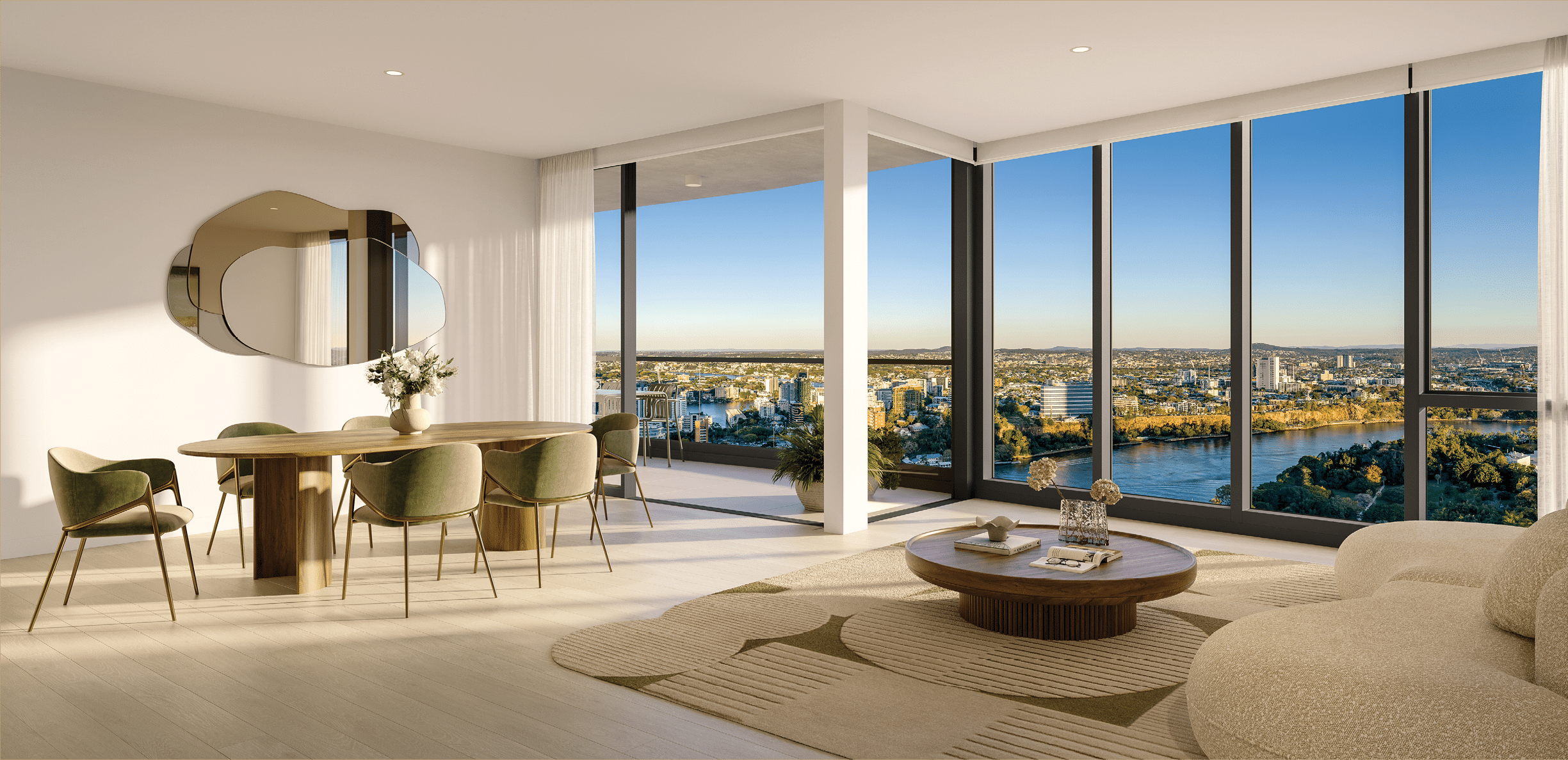 A modern living and dining area features large floor-to-ceiling windows with a panoramic city view, a round wooden dining table with green chairs, a beige curved sofa, a round coffee table, and a decorative wall mirror. Description generated by AI