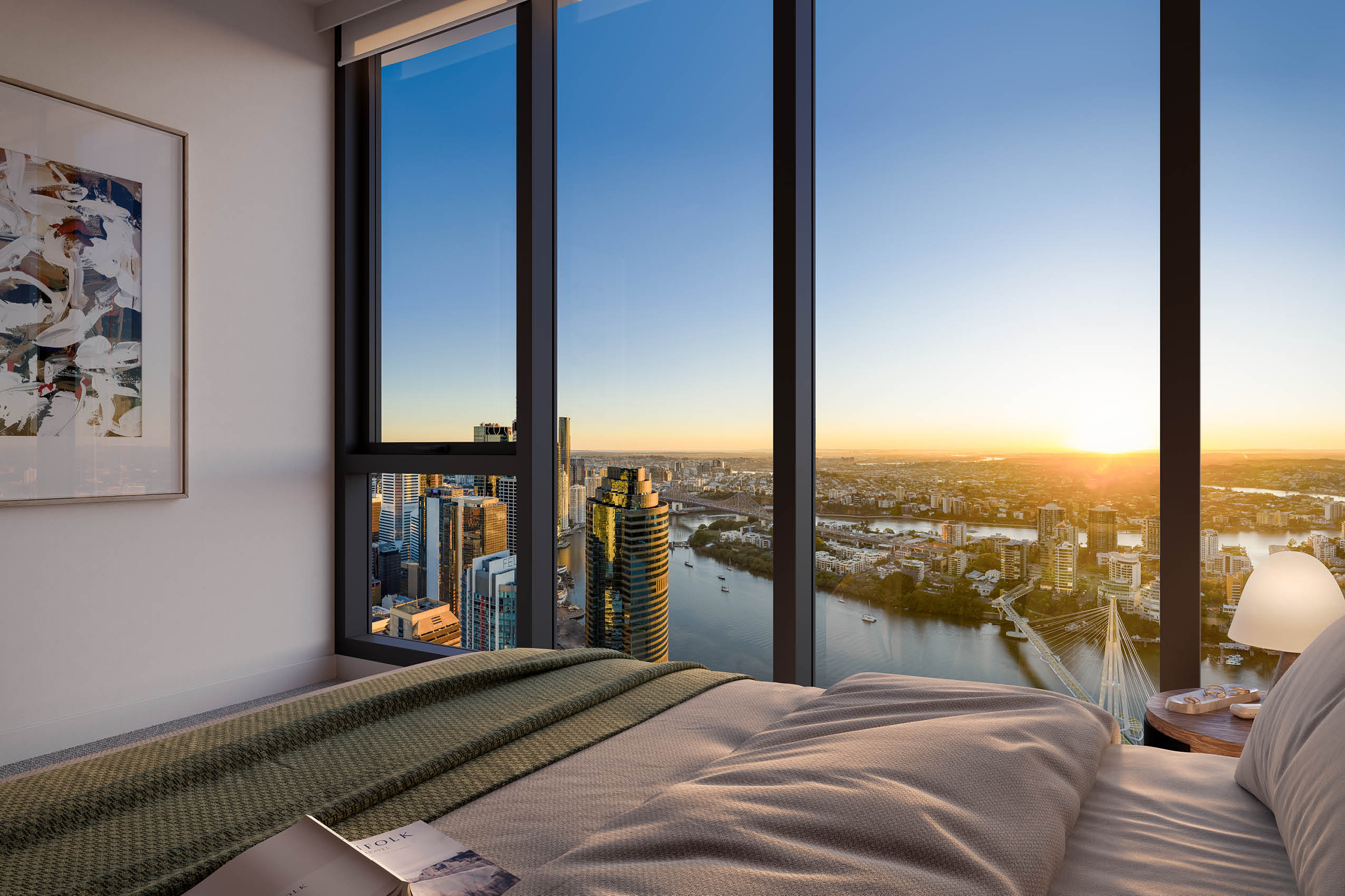 A modern bedroom with a large bed faces floor-to-ceiling windows offering a panoramic view of a city skyline and river at sunset. Description generated by AI