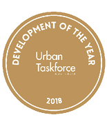 A gold circular badge with white text reading Development of the Year, Urban Taskforce Australia, and 2018. Description generated by AI
